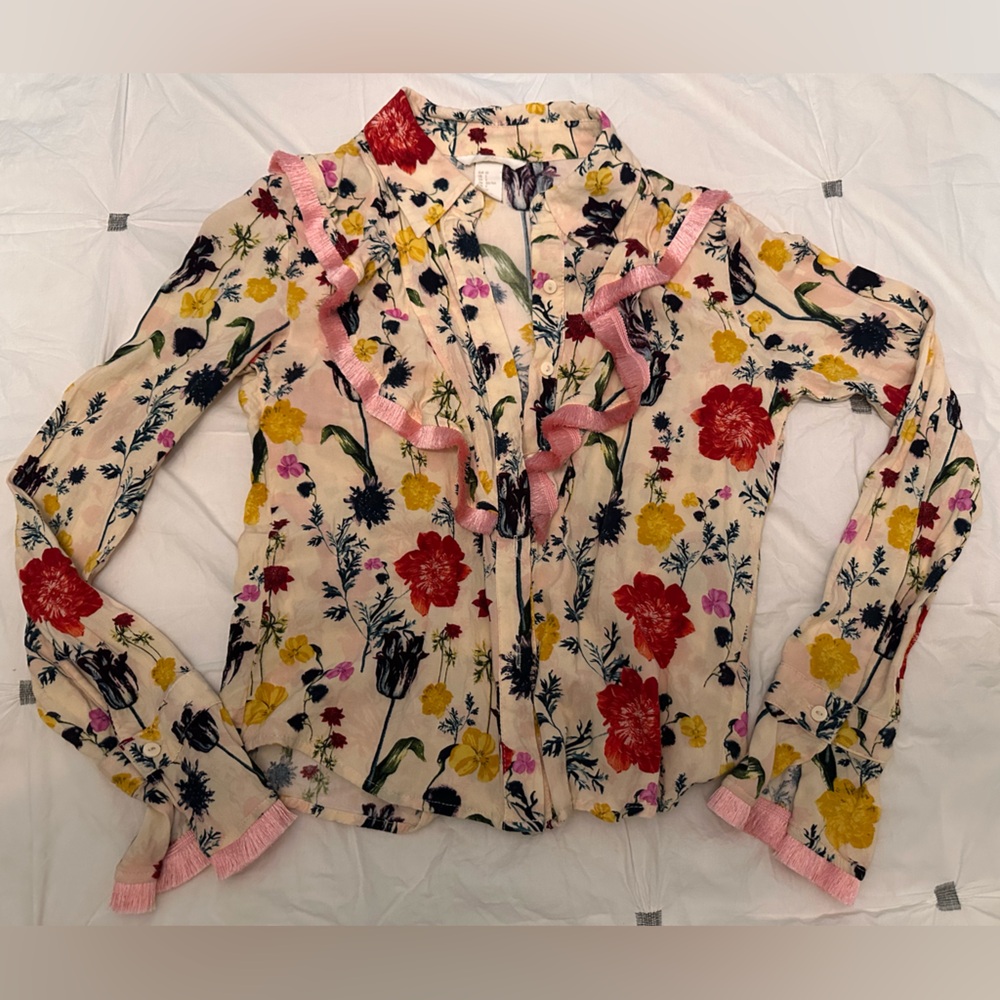 Floral button shirt.